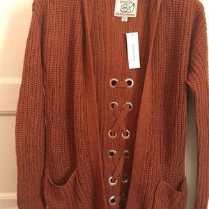 Brand new coat size M coat has pockets and hoodie